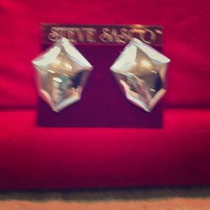Large silver tone earring set